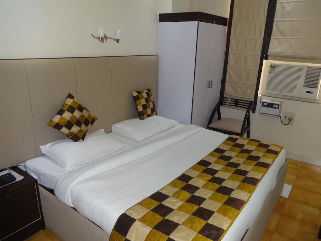 Hotel Grace Nueva Delhi Habitación foto